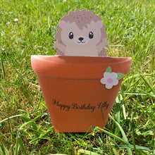 Load image into Gallery viewer, A flowerpot card with a cute hedgehog peeking out of it
