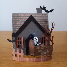 Load image into Gallery viewer, Haunted Halloween house card with ghosts and bats
