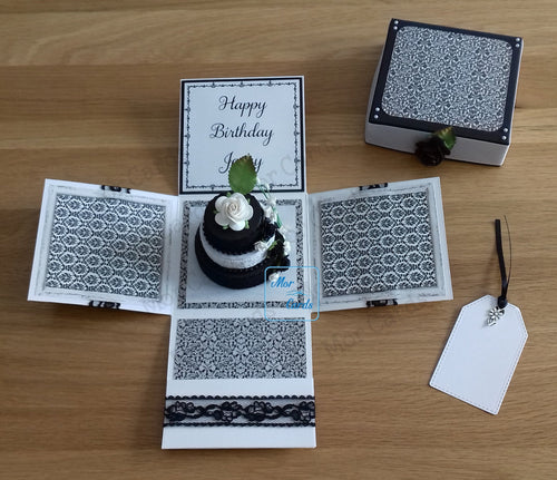 Exploding box card with a black & white cardboard decorated cake inside