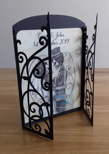 gatefold card with a skeleton wedding couple